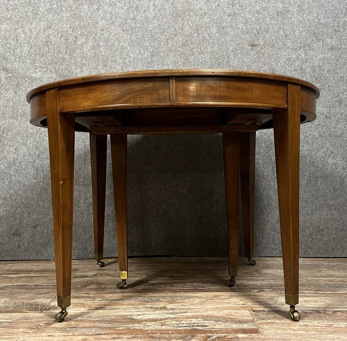 table a 6 pieds a allonges style Louis XVI en acajou vers 1850