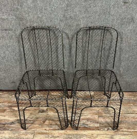 paire de chaises design industriel en fer tressé vers 1980