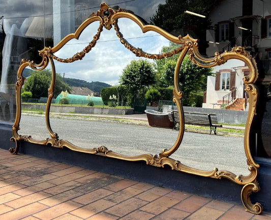 miroir style Louis XV en bois doré vers 1900 ( prés de 3 mètres de long )