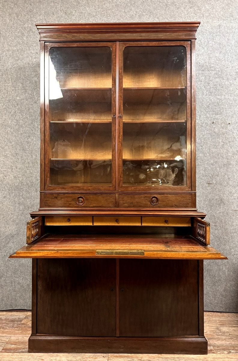 Cabinet formant buffet à secrétaire dissimulé et bibliothèque en acajou moucheté époque Napoléon III vers 1850.