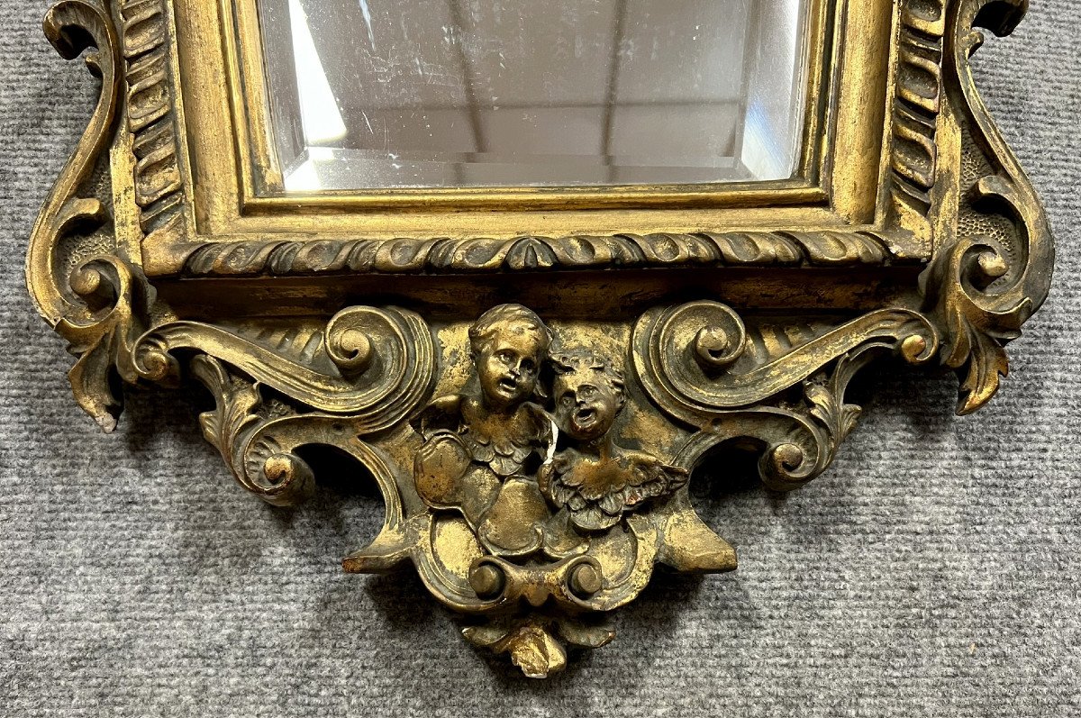 Italie XIXeme : Miroir Louis XV Baroque aux putti en bois doré vers 1850