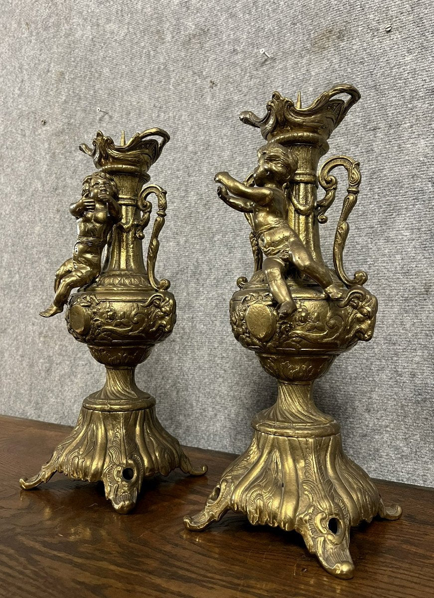 Paire de cassolettes aux putti en bronze doré époque XXeme siècle